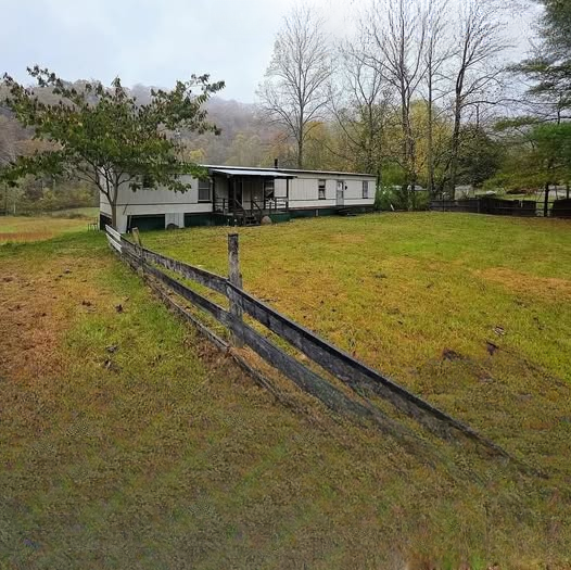 Hidden Riverfront Opportunity: 1.7 Acres Along the Beautiful Red Bird River with Incredible Potential for Renovation, Recreation, or a Peaceful Country Retreat