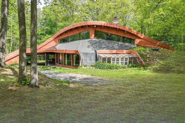 Exploring a Thoughtfully Designed Earth Home Surrounded by Nature and Waterfront Views