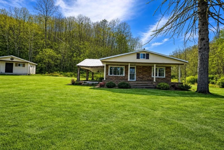Discover This Affordable 6.9-Acre Brick Fixer-Upper with Creek Frontage and Endless Possibilities