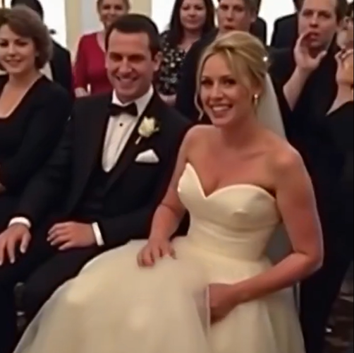 A Wedding Ceremony Went Quiet When Something Moved Under the Bride’s Dress — The Unexpected Truth Had Everyone Smiling